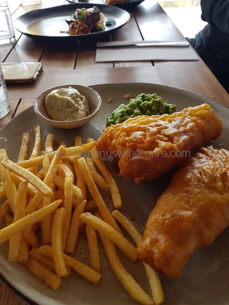 Beer battered fish and chips, mushy peas, Hermanus restaurant, near Cape Town South Africa