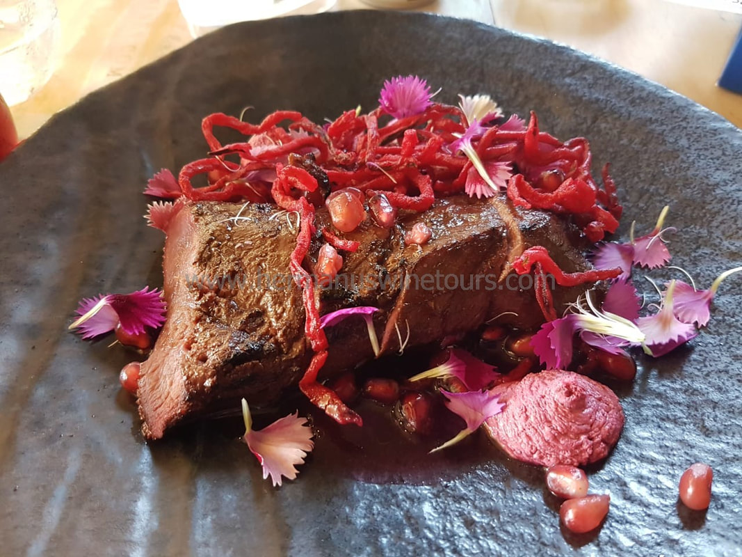 Springbok fillet, beetroot and pomegranate jus, Hermanus restaurant, near Cape Town, South Africa
