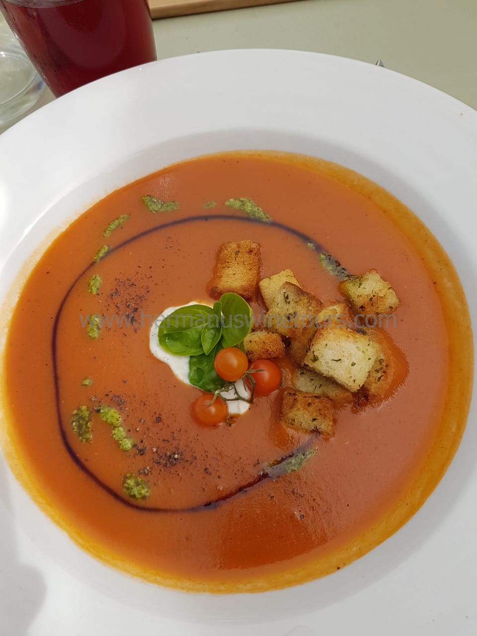 Creamy Tomato soup, pesto, croutons, Hermanus restaurant, South Africa