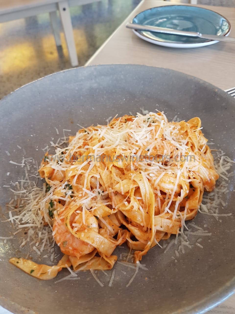Spicy Prawn tomato linguini, parmesan cheese, Hermanus restaurant, near Cape Town, South Africa